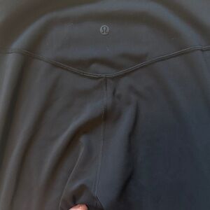 Lululemon black WunderTrain Smooth Cover High Rise Tight 28"